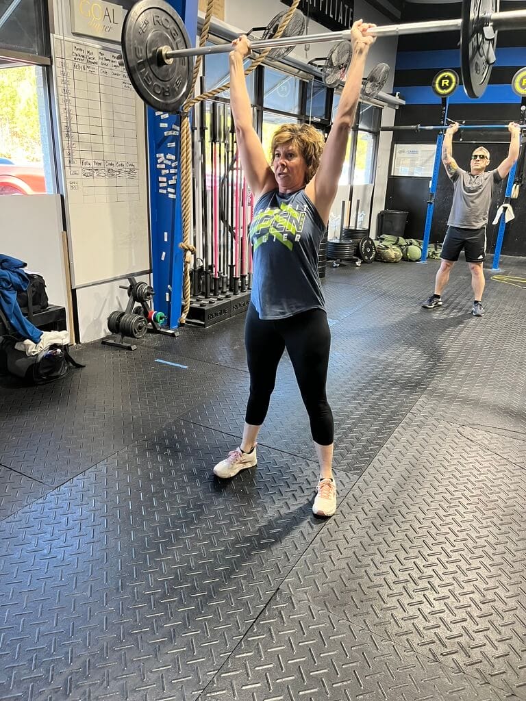 woman doing 1/2 murph workout